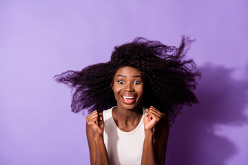 Sticker - Portrait of attractive cheerful ecstatic overjoyed girl air blowing hair rejoicing isolated over bright violet purple color background