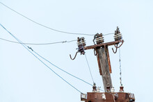 Electrical Insulators And Wires On An Old Pole