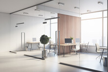 Modern Open Space Office Behind Glass Walls With Wooden Floor, Stylish Furniture And City View From Huge Windows