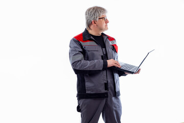 Poster - Adult computer technician. Gray-haired computer technician with laptop. She works as engineer or system administrator. Computer engineer in gray uniform. System administrator on white background