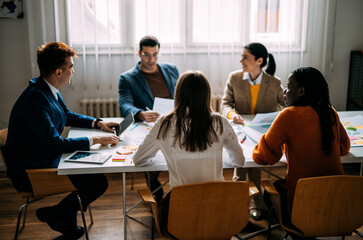 Cinematic image of   employers working in a start up business