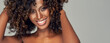 Close-up portrait of smiling black woman