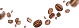 Fototapeta Sypialnia - Dark aromatic roasts beans coffee levitate on white background with copyspace.