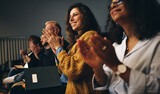 Fototapeta  - Business professionals applauding at a seminar
