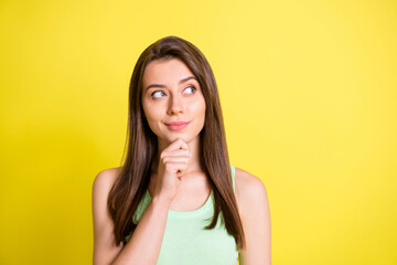 Poster - Photo of young attractive lovely happy positive thoughtful minded girl look copyspace thinking isolated on yellow color background