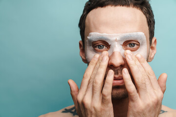 Wall Mural - Close up of a shirtless mid aged brunette man