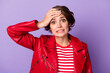 Photo of young woman unhappy sad upset hand touch forehead problem fail mistake isolated over purple color background