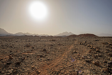 Barren rocky desert landscape in hot climate