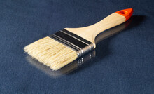 Paint Brush With Wooden Handle On The Table