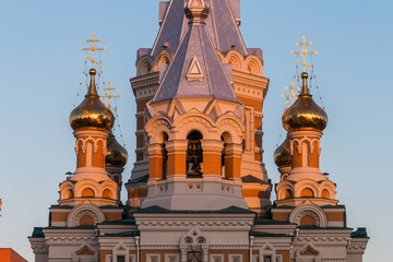 Wall Mural - Cathedral of Christ the Savior in the city of Uralsk (Kazakhstan). Golden domes and cross on the Orthodox Church.