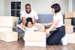 © Anatta_Tan - Family, African American father, Asian mother and 5-year-old daughter, they are happy together From moving or relocation to a new home, to family and relationship concept.