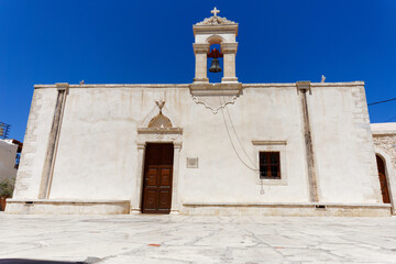 Canvas Print - Beautiful view of a small church against a blue sky