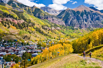 hiking above telluride - two men hiking above telluride colorado in the san juan mountains of southw