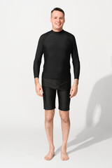 Canvas Print - Man wearing black rash guard mockup psd and swim shorts