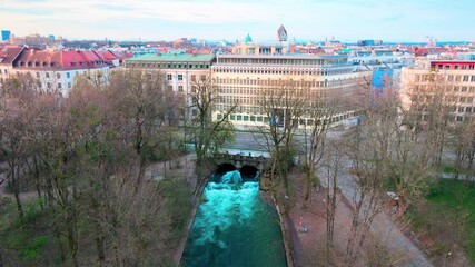 Sticker - Aerial view of surfers on the so called Eisbachschwelle in Munich, an artificial wave in the central park on which you can surf.