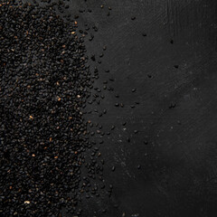 Wall Mural - Black sesame seed on black background. Organic food concept.