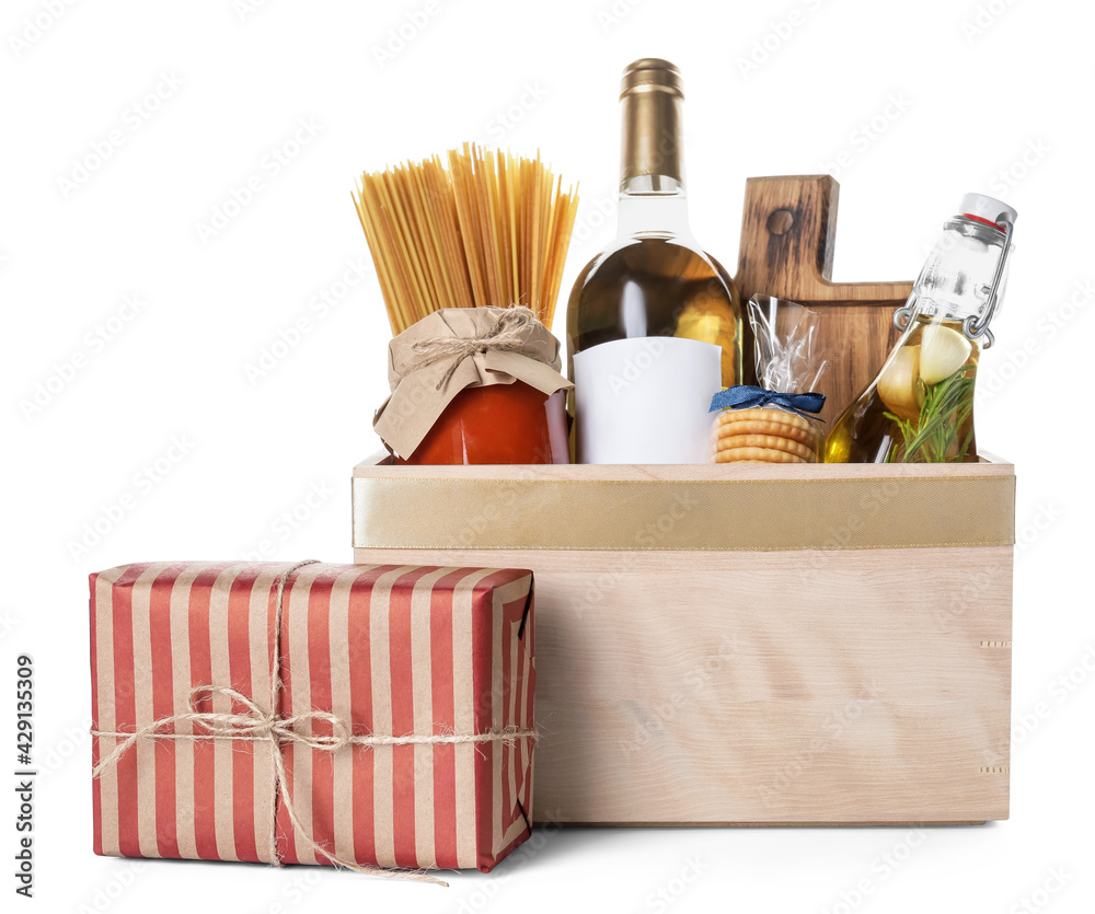 Gift basket with products and present on white background