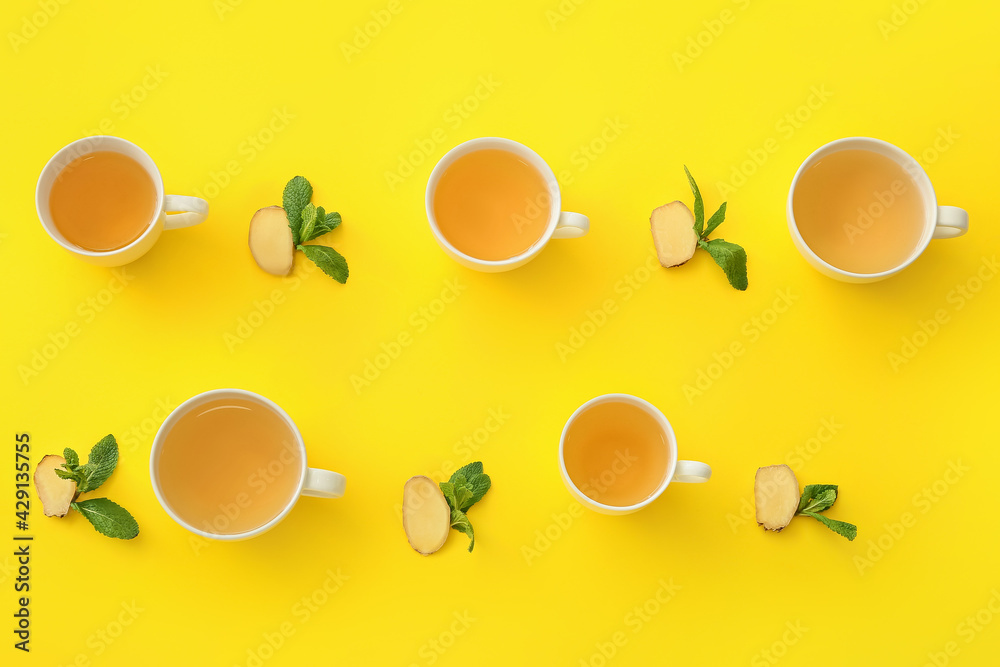 Composition with cups of tea, ginger and mint on color background