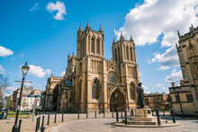 Gothic Architecture Of 12th Century Bristol Cathedral With Cloudy Blue Sky, Bristol, England