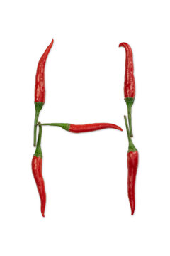 Font made of hot red chili pepper isolated on white - letter H