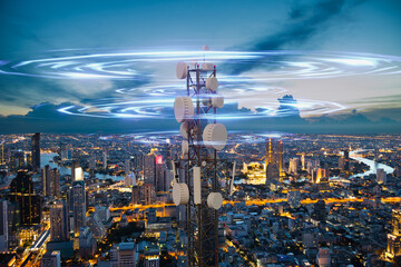 Wall Mural - Telecommunication tower with 5G cellular network antenna wave on night city background