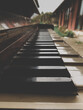 Vertical shot of an old piano keys outdoors