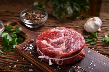 Wall Mural - Fresh raw beef meat on a cutting board