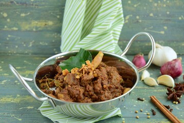 Wall Mural - Beef Rendang, spicy meat dish originated from Indonesia