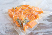 Vacuum Sealed Bag With Carrots Ready For Low Temperature Cooking Or Sous Vide