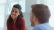 © stockbusters - Afro woman tapping man shoulder office. Businesswoman congratulating manager.