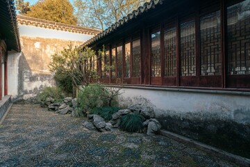 Landscape and buildings in Couple's Retreat Garden, a classical Chinese garden in Suzhou, China