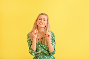 Sticker - Fashionable young woman on color background