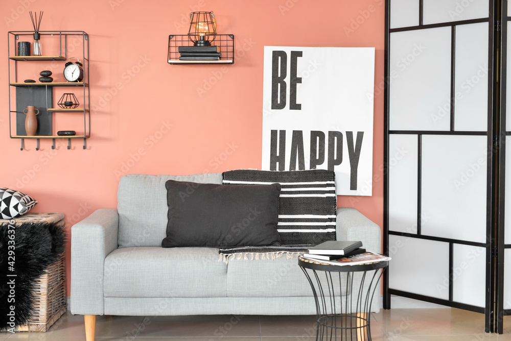 Comfortable sofa in interior of stylish room