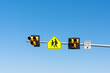 Overhead high visibility crosswalk sign. The traffic control device is officially known as HAWK - High Intensity Activated crossWalK beacon