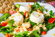 Rocket salad with goat cheese and honey dressing