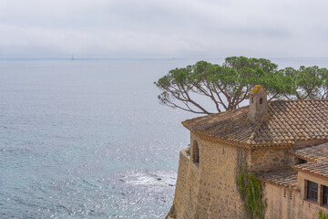 View of an old house facing the Mediterranean Sea in the town of CALELLA DE PALAFRUGELL