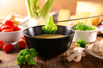 Wall Mural - cheese fondue with fresh vegetables