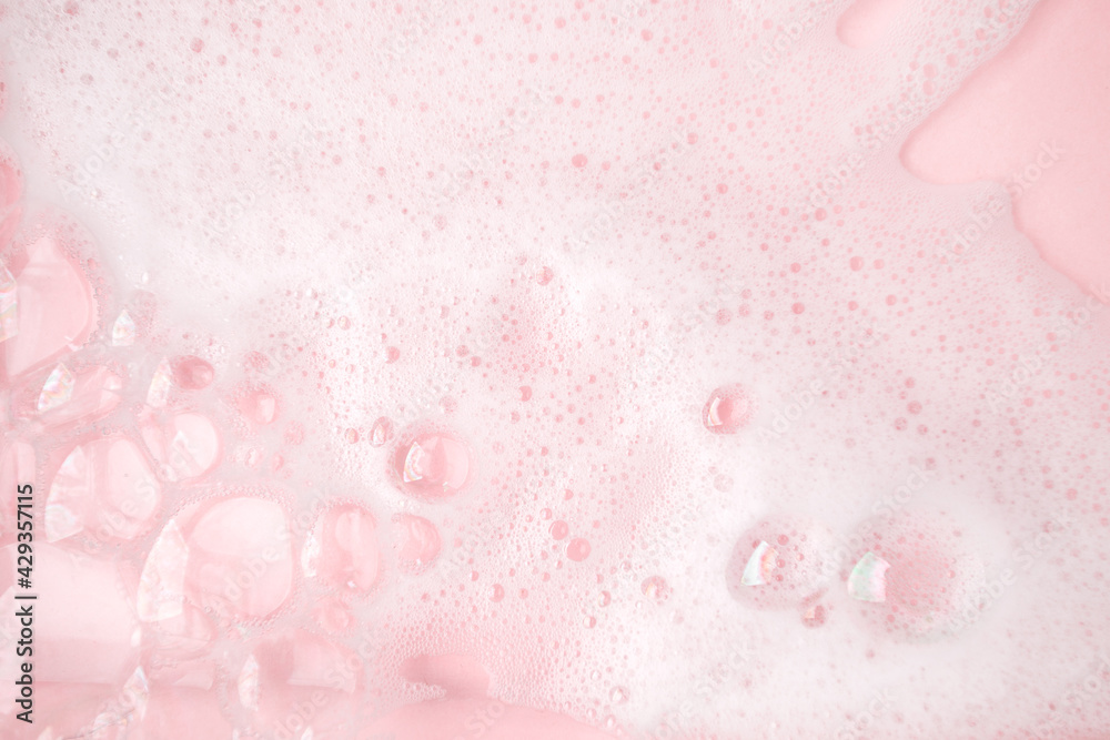 White foam bubbles texture on pink pastel background, copy space, banner for loundry, cleaning service, bathroom concept, clean, wash - liquid soap, shower gel, shampoo - obrazy, fototapety, plakaty 