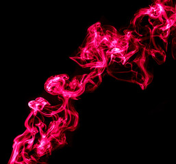 Red smoke isolated on black background.