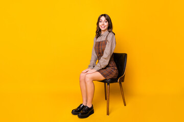 full size profile photo of optimistic funny brunette lady sit wear shirt dress sneakers isolated on 