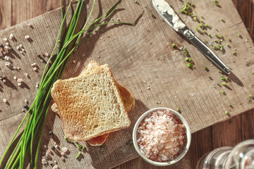 Sticker - Sandwiches on a wooden board with white cheese and chives