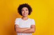 © Tetiana - Portrait of cheerful dreamy confident lady folded hands look empty space on yellow background