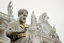 The Statue Of St. Peter In Front Of St. Peter's Basilica