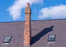 Tall Chimney On Sloped Roof