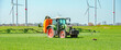 Tractor with crop sprayer in grain field 1218.jpg