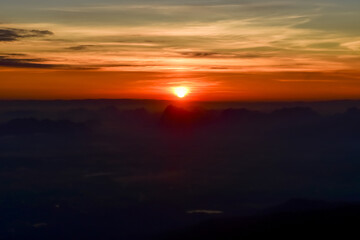 Wall Mural - Loei Province Thailand sunset at Phu Kradueng National Park. Is one of the attractions of the most famous of Thailand. Each year there are tens of thousands of people come to the average person