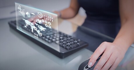 Poster - Composition of world map and digital icons on screen over woman using mouse and computer keyboard