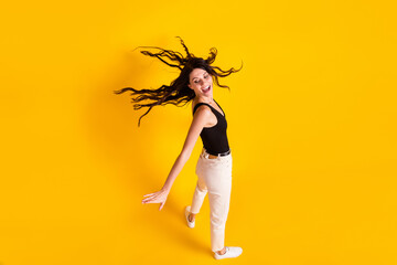 Poster - Top above high angle view full body photo of young excited girl fly air hair look empty space isolated over yellow color background