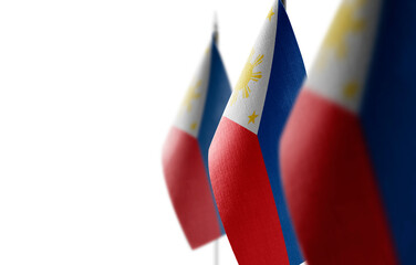 Small national flags of the Philippines on a white background