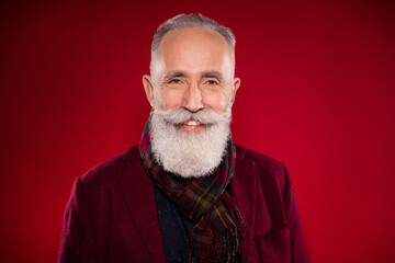 Sticker - Photo portrait of senior man with white beard smiling wearing vintage blazer isolated on bright red color background